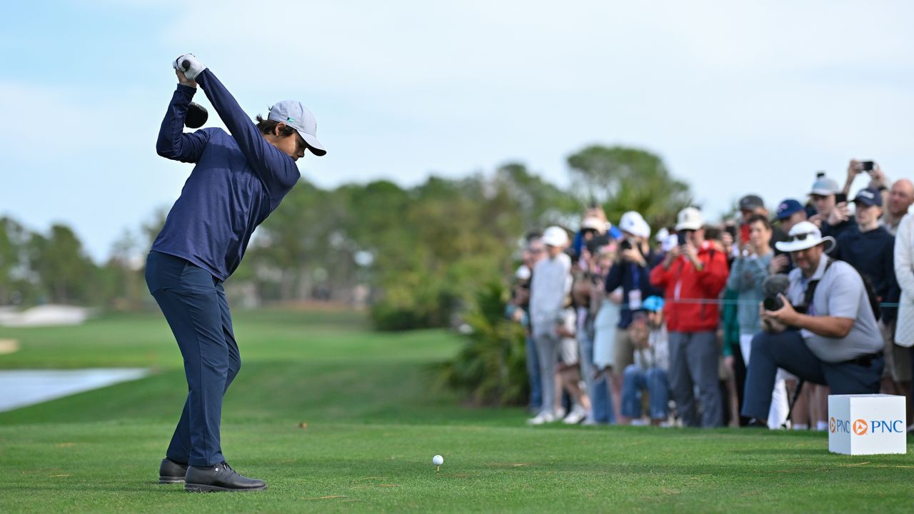 Charlie Woods hits a drive at the 2023 PNC Championship