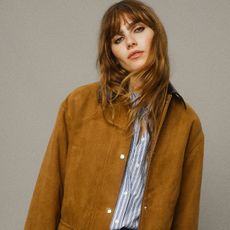 models wear H&M clothes including a suede-look jacket, a denim dress, and a cinched cardigan