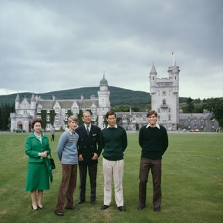 Queen Elizabeth II with Prince Philip, the Duke of Edinburgh and their sons Prince Edward (second from left), Prince Charles (second from right) and Prince Andrew (right) in the grounds of Balmoral Castle in Scotland, UK