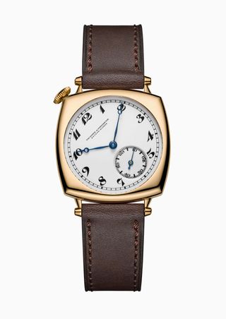 A Vacheron Constantin watch with a gold case and brown leather strap