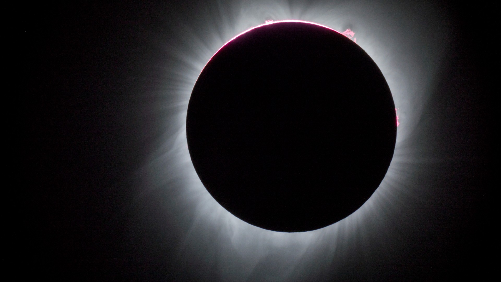 a total solar eclipse seen against a black sky