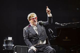 Elton John performing.