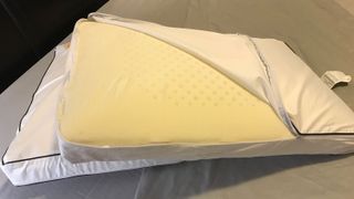 Nolah Cooling Foam Pillow with the cover pulled back