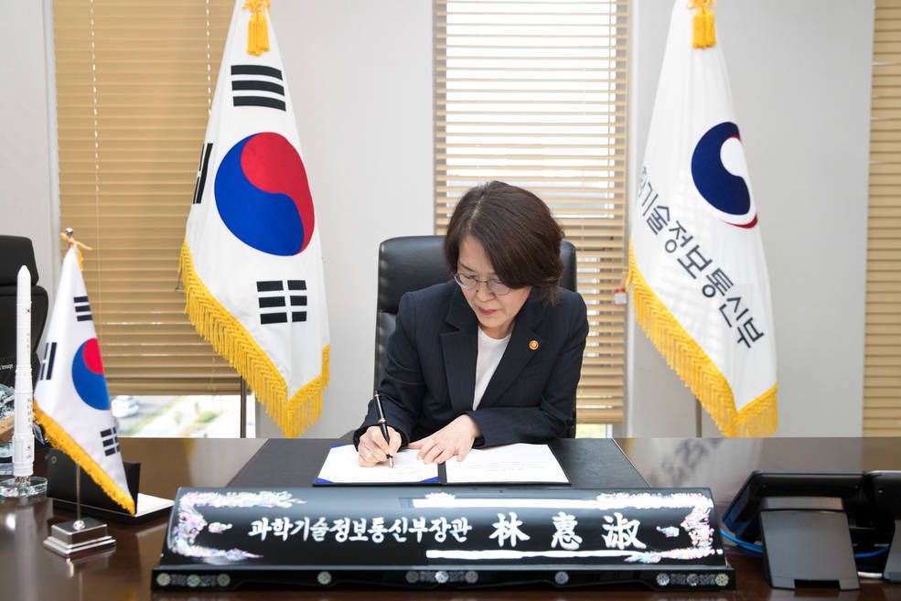 Republic of Korea Minister of Science and ICT Lim Hyesook signs the Artemis Accords during a ceremony in Seoul on May 24, 2021.