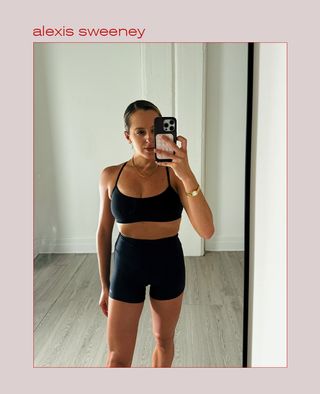 Woman taking a selfie while wearing a workout set.