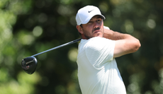 Brooks Koepka hits a driver off the tee
