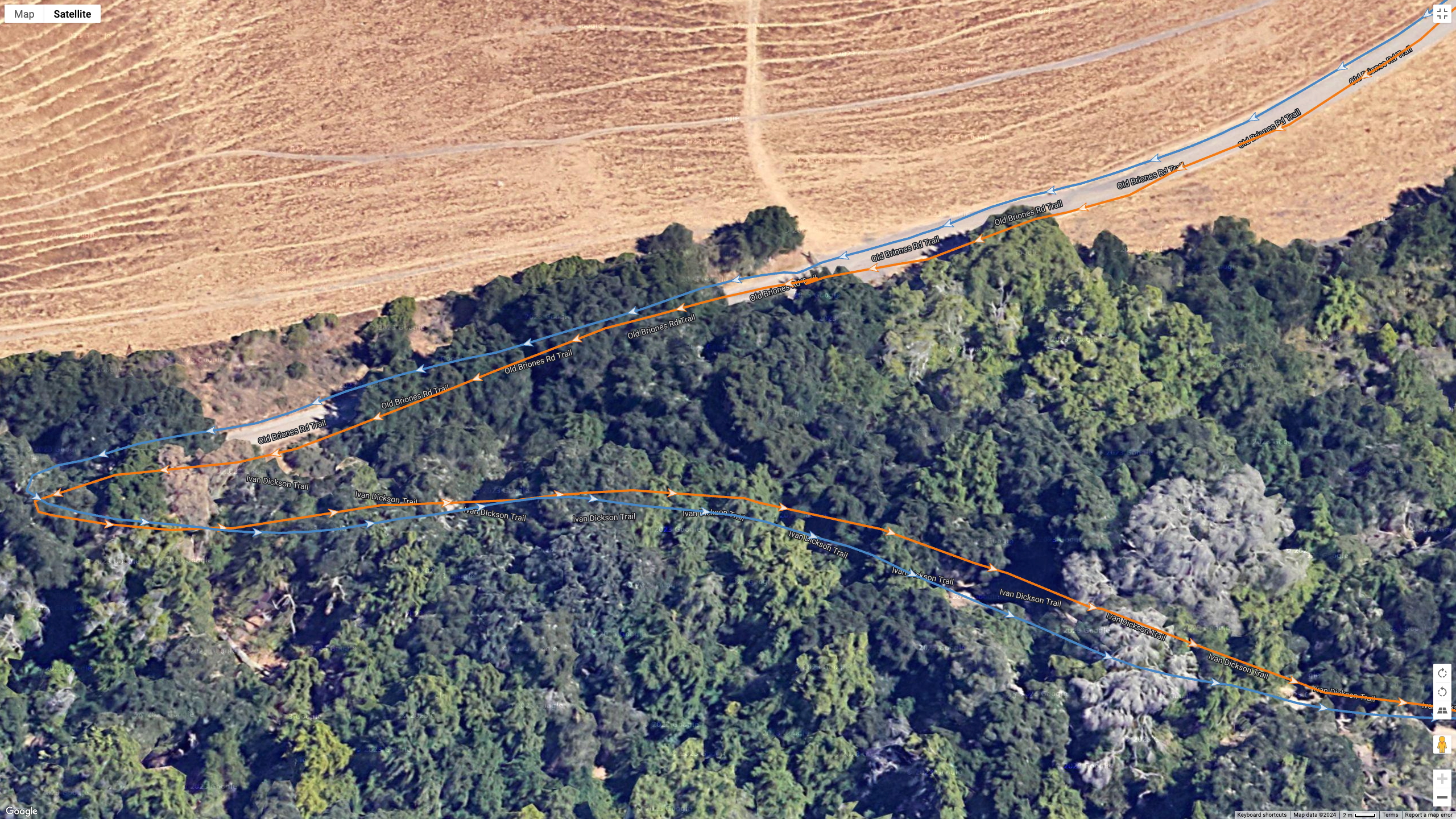 A Google Earth satellite image showing how the COROS PACE Pro (blue line) compares to the Garmin Fenix 8 (orange line) for a dual-band GPS accuracy test.