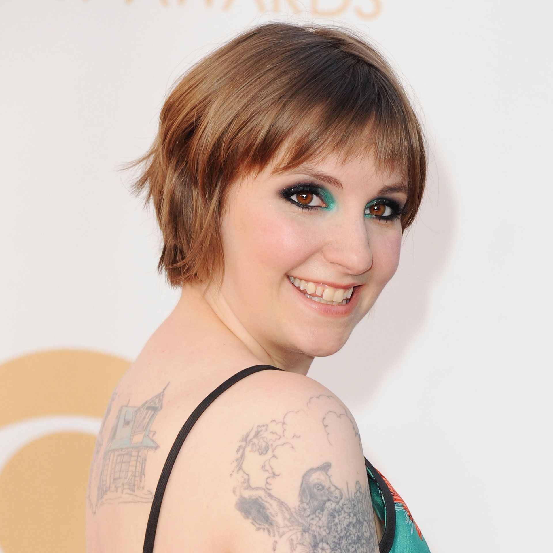 Lena Dunham smiling.