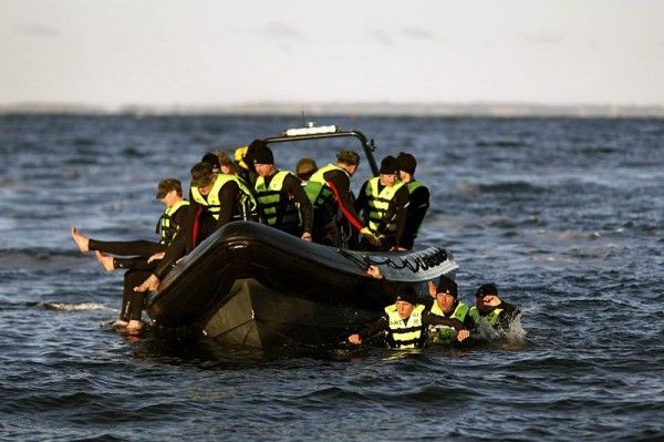 One by one the team members had to jump into the cold sea and swim to the shore
