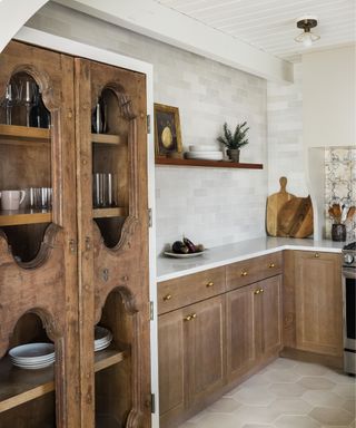 Modern rustic kitchen by Shannon Tate Interiors with wooden cabinets and a glazed wooden dresser cabinet