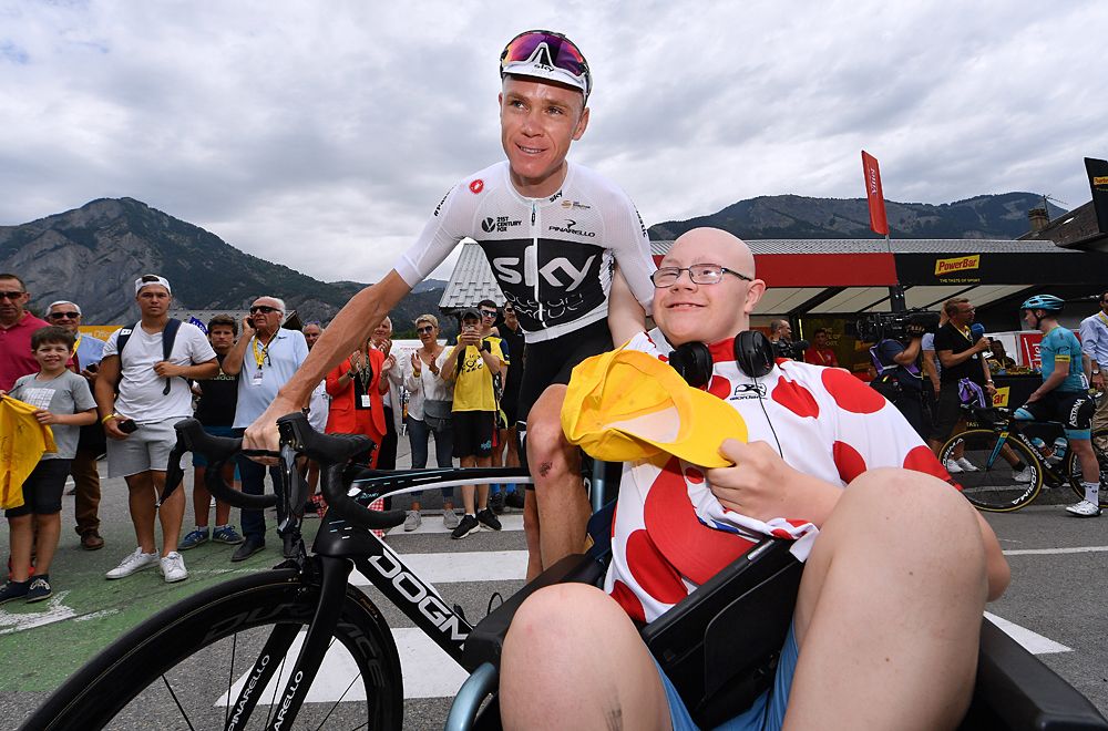 Chris Froome (Team Sky) meets with fans at the start of stage 13 at the Tour de France