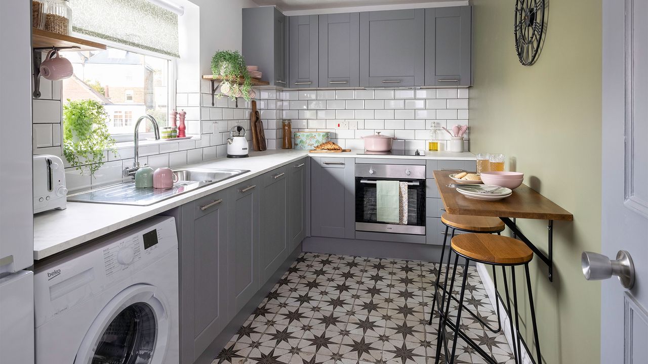 kitchen makeover with grey kitchen units and tiled floor