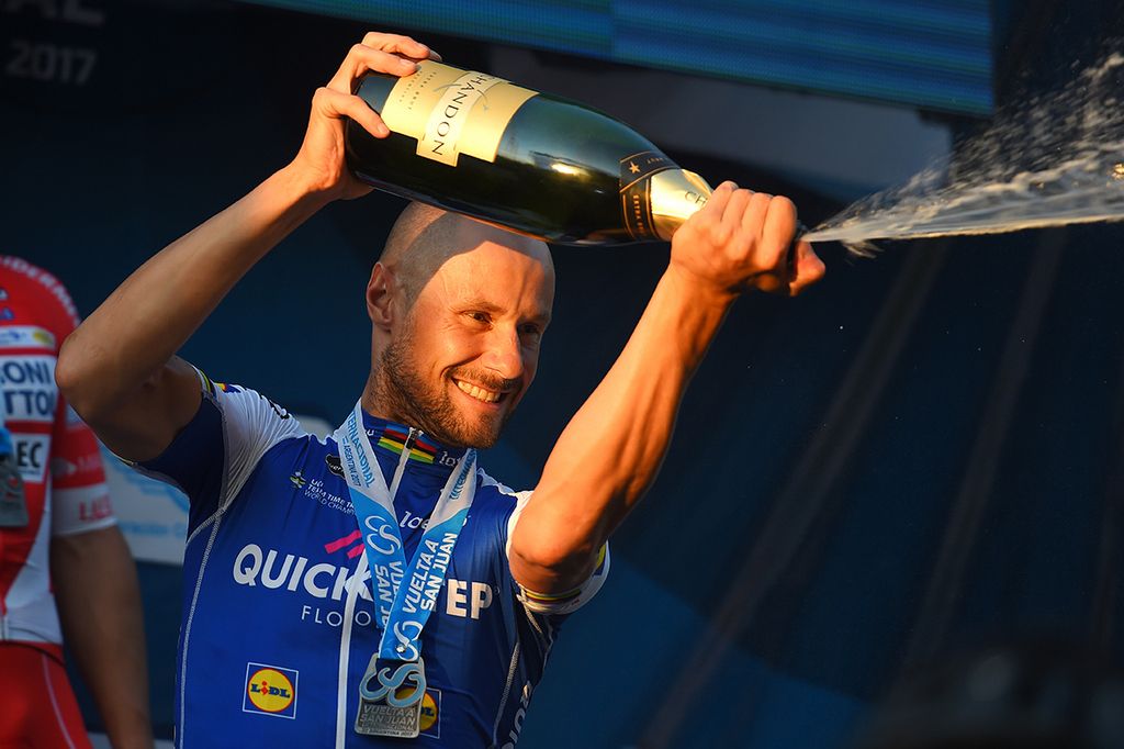 Tom Boonen pours the champagne from the podium