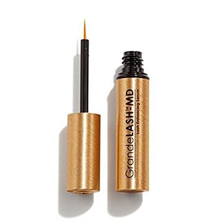 Grande Cosmetics Grandelash-Md Lash Enhancing Serum open beside its applicator on a white background