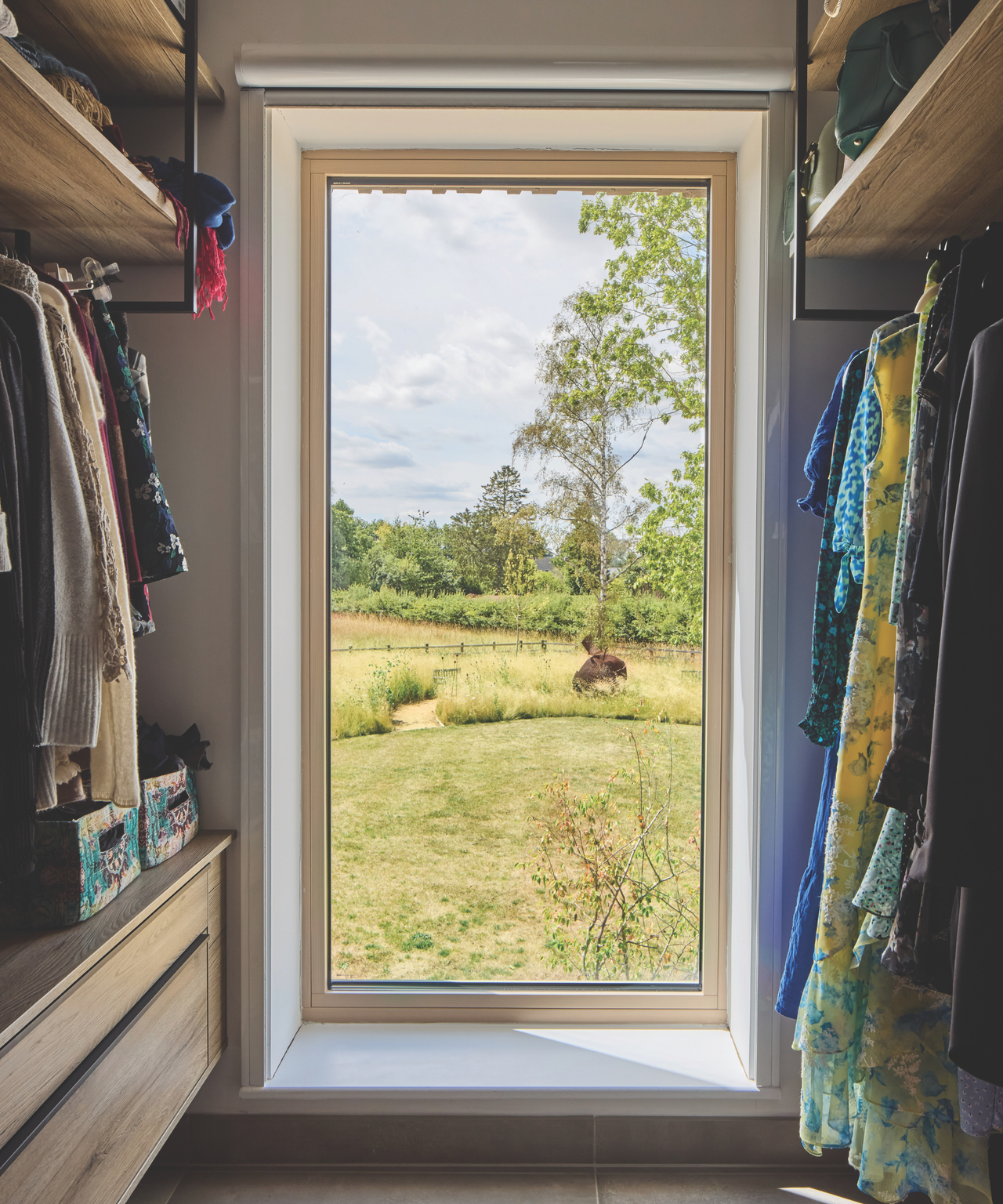 Wardrobe with long window overlooking gaRDEN