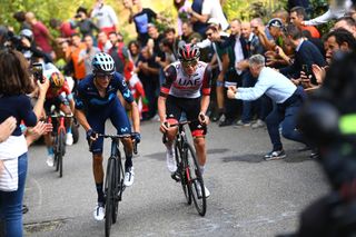 COMO ITALY OCTOBER 08 LR Enric Mas Nicolau of Spain and Movistar Team and Tadej Pogacar of Slovenia and UAE Team Emirates compete in the breakaway during the 116th Il Lombardia 2022 a 253km one day race from Bergamo to Como iLombardia on October 08 2022 in Como Italy Photo by Tim de WaeleGetty Images