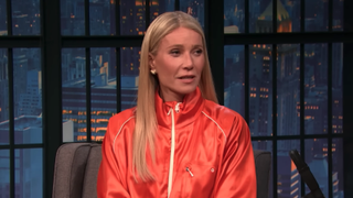 Gwyneth Paltrow wearing a salmon-colored tracksuit on Seth Meyers on December 16, 2025