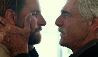 A Star Is Born Sam Elliot holds Bradley Cooper's face in his hands