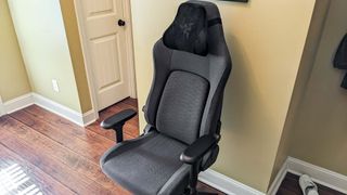 The Razer Iskur V2 in gray with a black headrest pillow