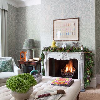 Festive living room with marble fireplace