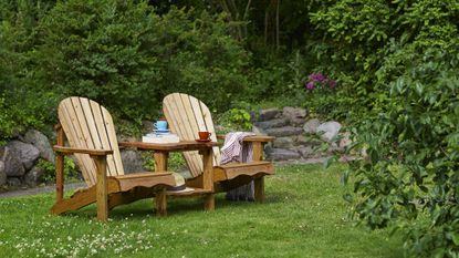 adirondack style love seat from Wayfair