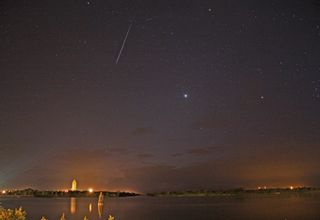 Shuttle Discovery and a Meteor