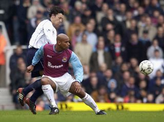 West Ham's Trevor Sinclar battles with Tottenham's Simon Davies in March 2003.