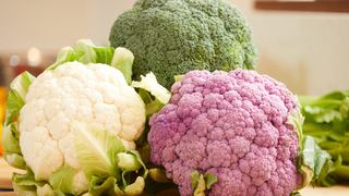 broccoli, pink cauliflower and cauliflower