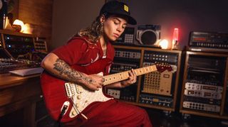 Tash Sultana with their Fender Signature Strat