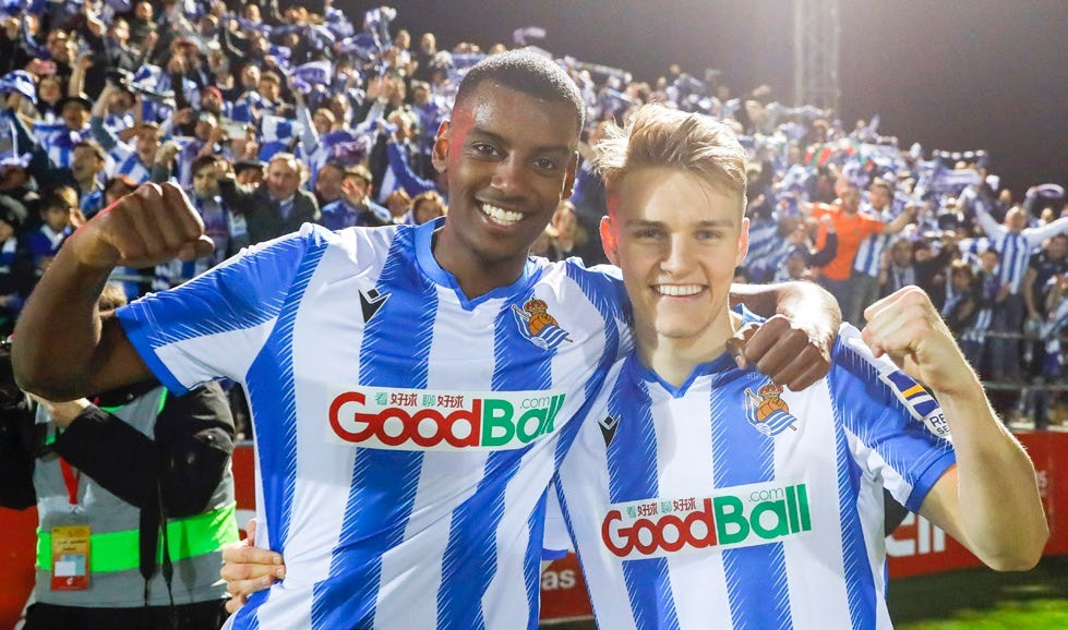 MIRANDA DE EBRO, SPAIN - MARCH 04: (BILD ZEITUNG OUT) Alexander Isak of Real Sociedad and Martin Odegaard of Real Sociedad smiles during the Copa del Rey semifinal 2nd leg match between Mirandes and Real Sociedad at Estadio Municipal de Anduva on March 4, 2020 in Miranda de Ebro, Spain. (Photo by DeFodi Images via Getty Images)