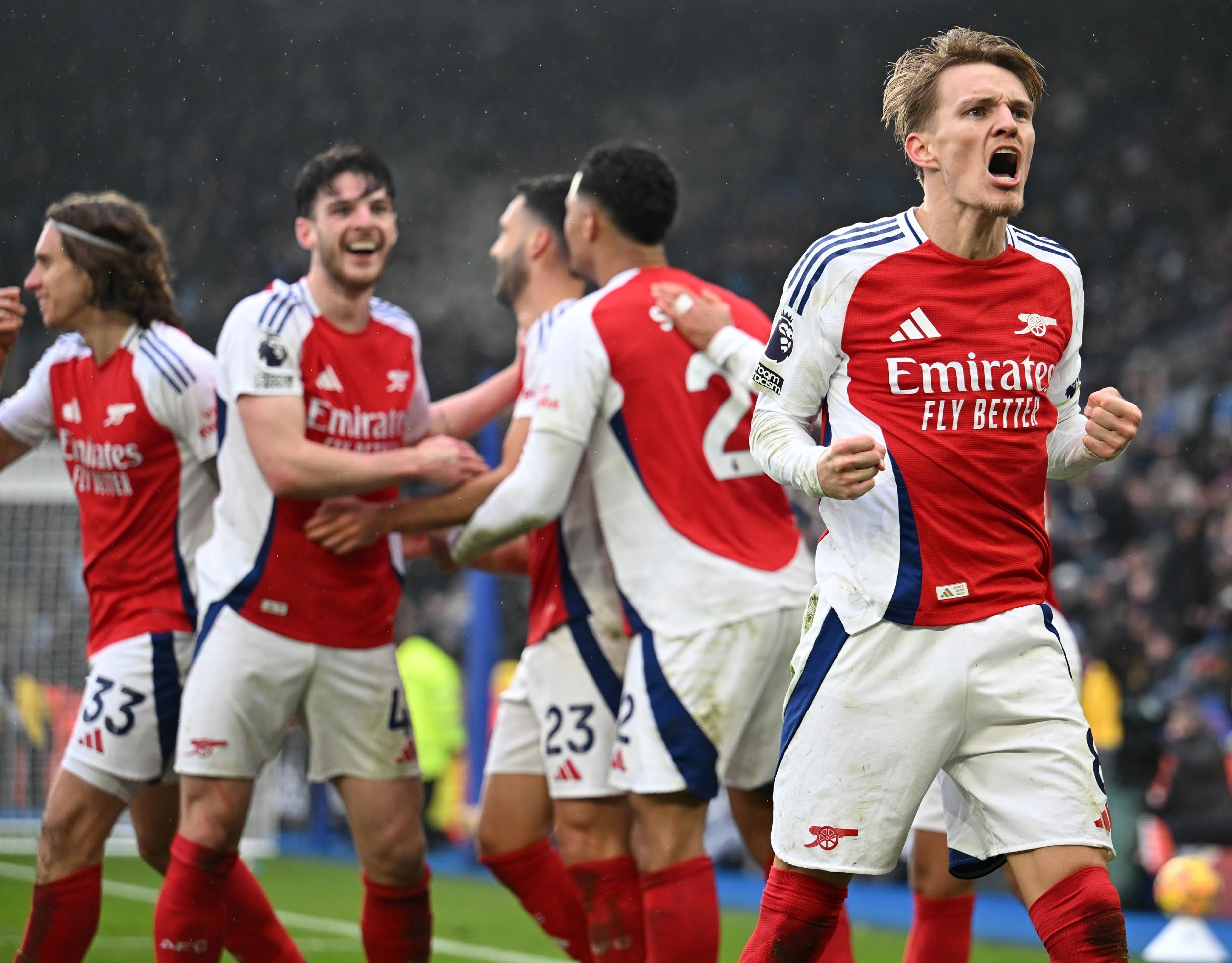 LEICESTER, ENGLAND - FEBRUARY 15: Martin Odegaard of Arsenal celebrates after Mikel Merino of Arsenal (not pictured) scores his team's second goal during the Premier League match between Leicester City FC and Arsenal FC at The King Power Stadium on February 15, 2025 in Leicester, England. (Photo by David Price/Arsenal FC via Getty Images)