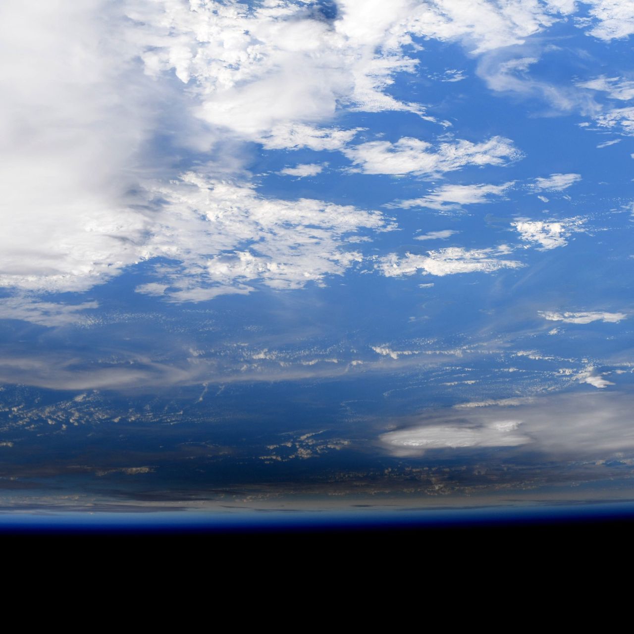 NASA astronaut Jessica Meir captured these photos of the Dec. 26, 2019 annular solar eclipse from the International Space Station. They show the moon's shadow moving across the surface of the Earth.