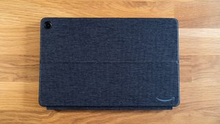 Amazon Fire Max 11 tablet case on a wooden surface