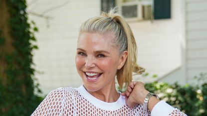 SOUTHAMPTON, NY - AUGUST 05: Host Christie Brinkley attends the Southampton Sweat on August 5, 2018 in Southampton, New York. (Photo by Mark Sagliocco/Getty Images for Hamptons Magazine)