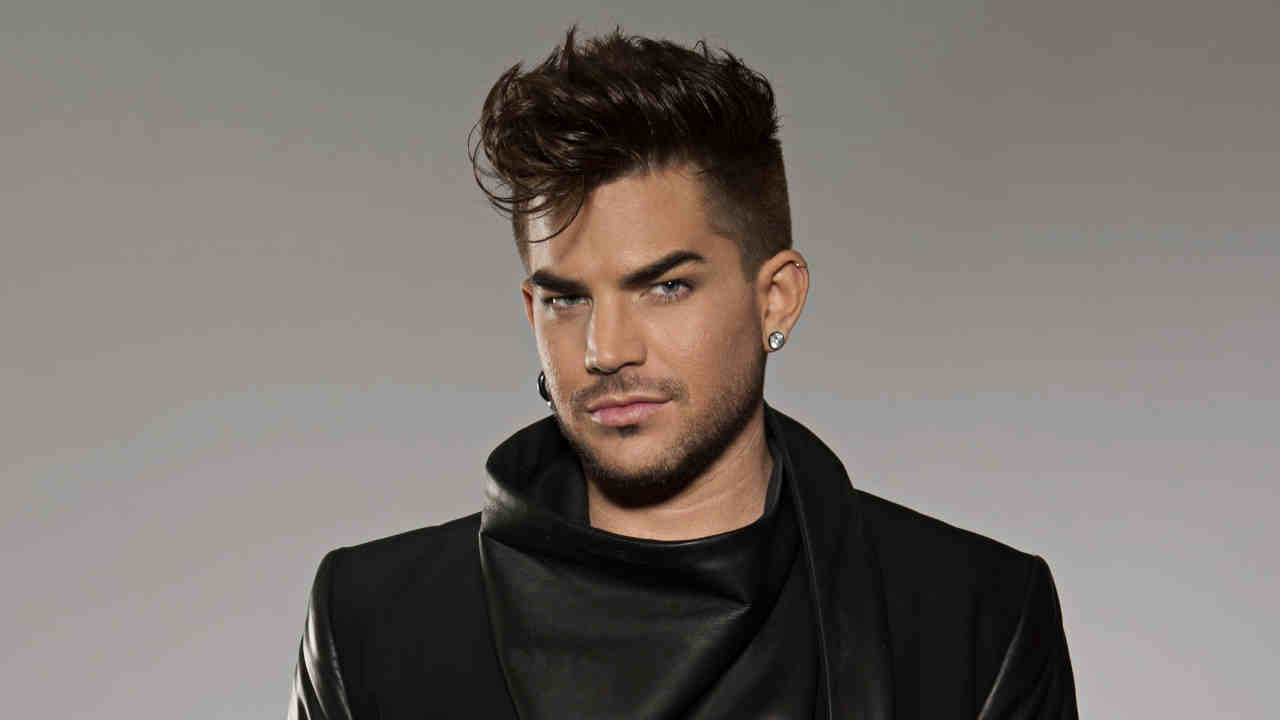 Queen’s Adam Lambert posing for a photograph in 2014