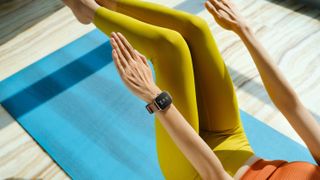 Person doing yoga wearing the Amazfit GTS 3