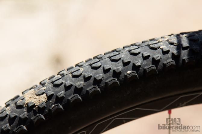 Wallace often picks the Maxxis Ikon 3C EXO TR rubber in a generous 2.2" width