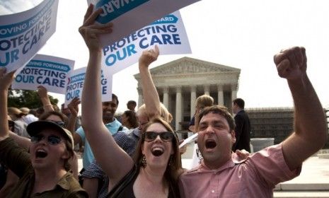 ObamaCare supporters celebrate Thursday after the Supreme Court rules that the bulk of President Obama&amp;#039;s health-care overhaul is constitutional.