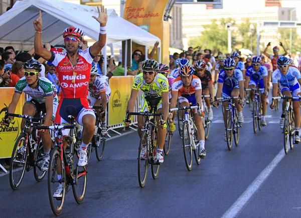 Javier Benitez (Contentpolis-Ampo) claims his stage victory.