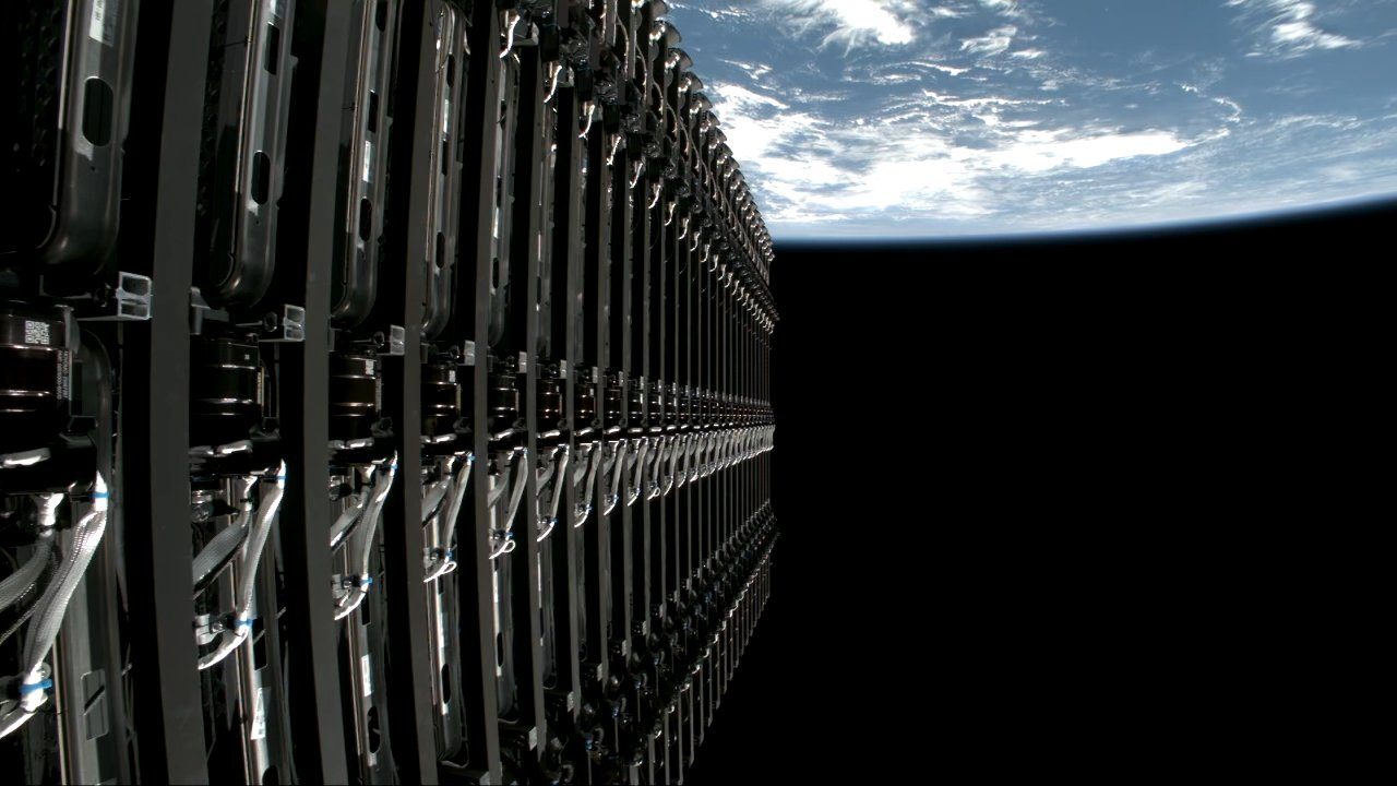 view from a rocket&#039;s upper stage in orbit, showing a stack of satellites with earth in the background