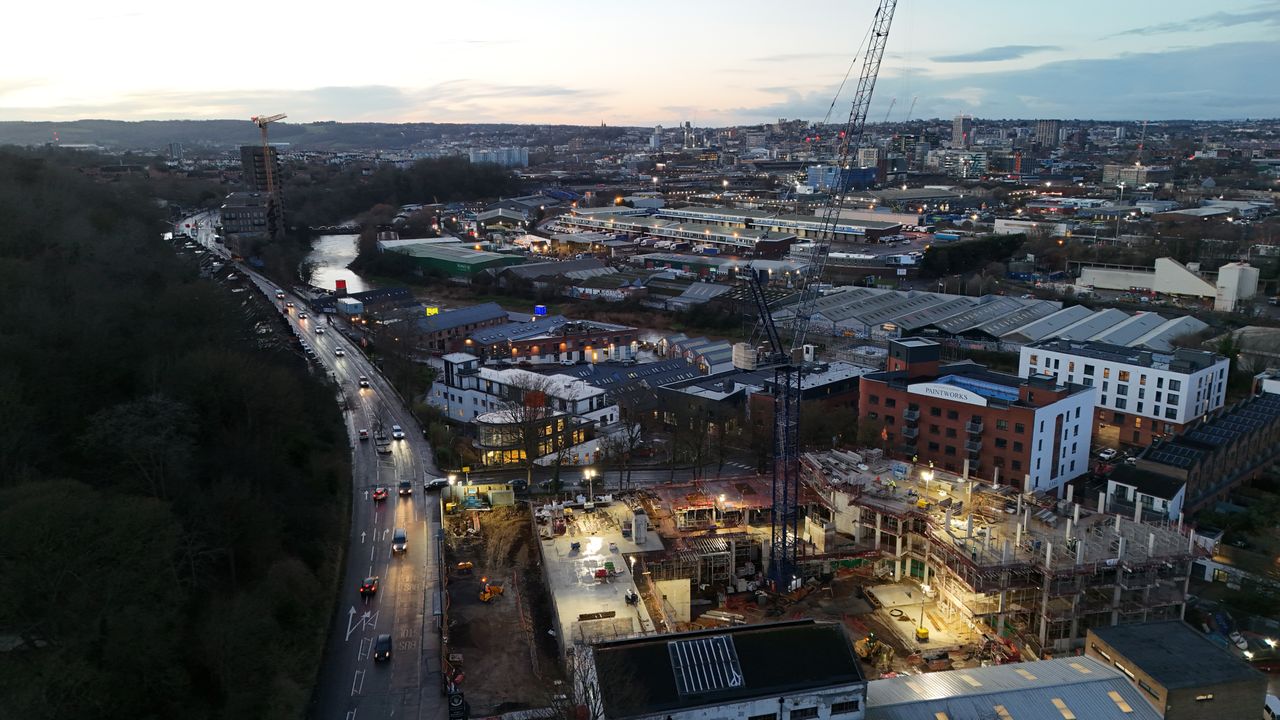 A photo of a city at dusk, taken on a DJI Flip drone