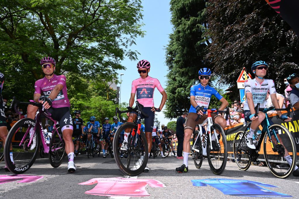 ALPE DI MERA VALSESIA ITALY MAY 28 Peter Sagan of Slovakia and Team Bora Hansgrohe Purple Points Jersey Egan Arley Bernal Gomez of Colombia and Team INEOS Grenadiers Pink Leader Jersey Geoffrey Bouchard of France and AG2R Citren Team blue mountain jersey Aleksander Vlasov of Russia and Team Astana Premier Tech white best young jersey The peloton at start in Abbiategrasso City during the 104th Giro dItalia 2021 Stage 19 a 166km stage from Abbiategrasso to Alpe di Mera Valsesia 1531m Stage modified due to the tragic events on May the 23rd 2021 that involved the Mottarone Cableway UCIworldtour girodiitalia Giro on May 28 2021 in Alpe di Mera Valsesia Italy Photo by Stuart FranklinGetty Images
