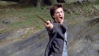 Harry Potter holds a wand in Harry Potter and the Prisoner of Azkaban