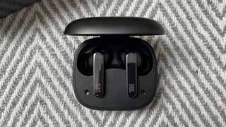 Black JBL Live Pro 2 TWS wireless earbuds in their charging case