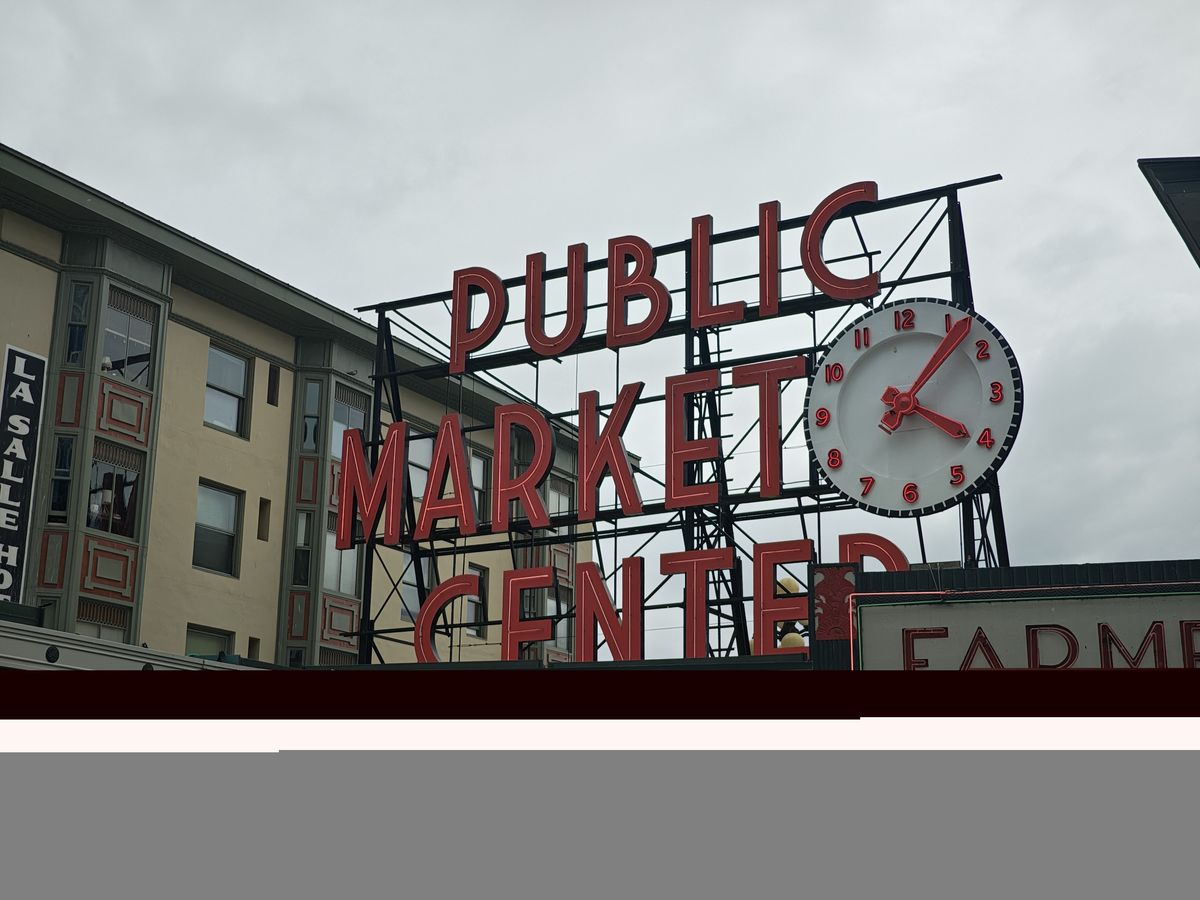 A red Public Market Center sign