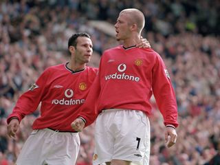 David Beckham celebrates with Ryan Giggs after scoring for Manchester United against Fulham in 2001.