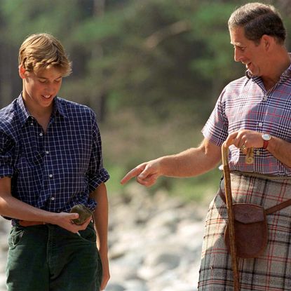 Prince Charles With Prince William In Open-necked Shirts At Polvier By The River Dee, Balmoral Castle Estate