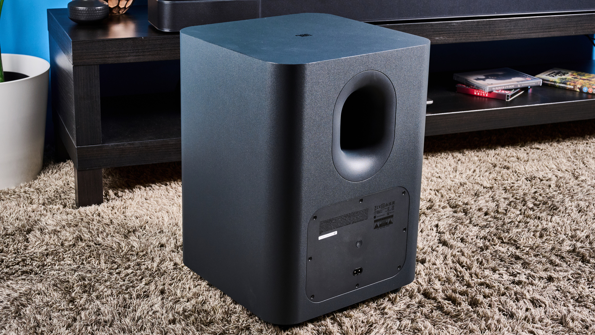 the jbl bar 1300x a black soundbar with HDMI ports, two surround channel speakers, a subwoofer wirelessly connected
