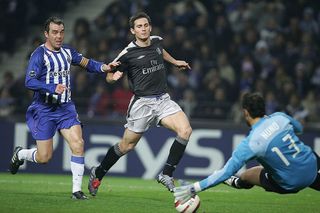 Frank Lampard of Chelsea has his shot stopped by Nuno E Santo of Porto during the Champions League Group H match between FC Porto and Chelsea at the Estadio Do Dragao on December 7, 2004 in Porto, Portugal.