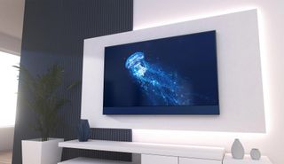 Sky Glass on a wall with a jellyfish on the display